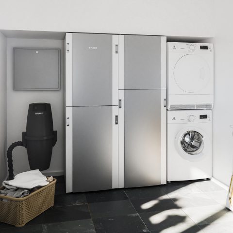 Centrinė mikroklimato sistema Econordic pagalbinėse patalpose šalia vakuuminio dulkių siurblio ir skalbimo mašinos